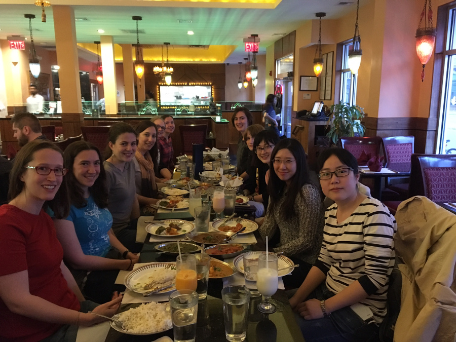 Physicists from MIT & Harvard discussing over delicious Indian food